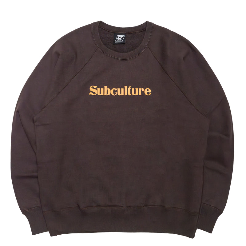 CREW NECK（SUBCULTURE CRACK PRINT）/ BROWN